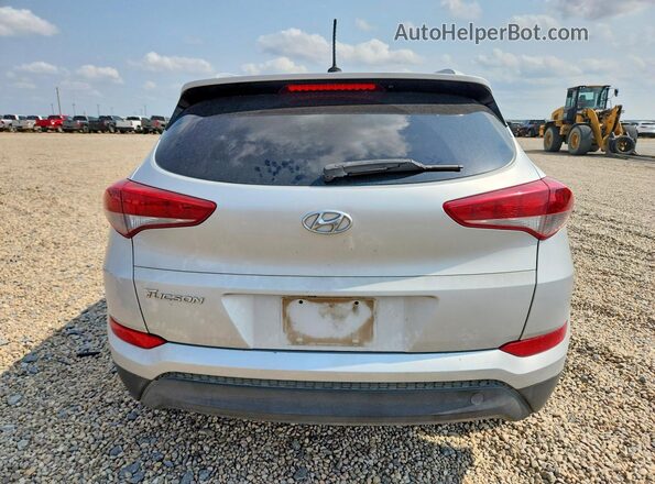 KM8J33A4XGU092568 2016 HYUNDAI TUCSON Серебряный Вид сзади
