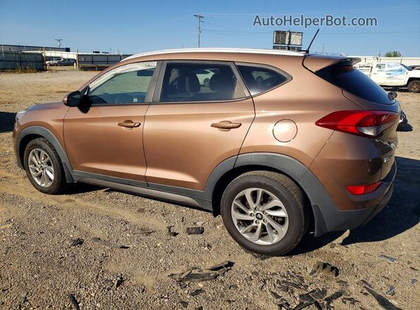 KM8J33A4XGU199751 2016 HYUNDAI TUCSON Brown Вид спереду
