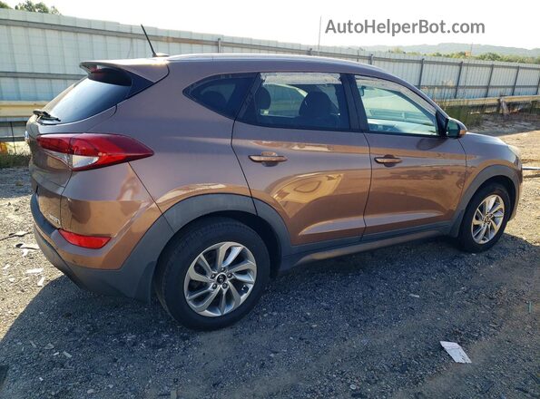 KM8J33A4XGU199751 2016 HYUNDAI TUCSON Brown Вид ззаду