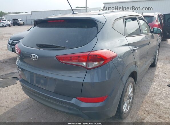 KM8J33A4XGU207251 2016 HYUNDAI TUCSON Серый Задняя правая четверть