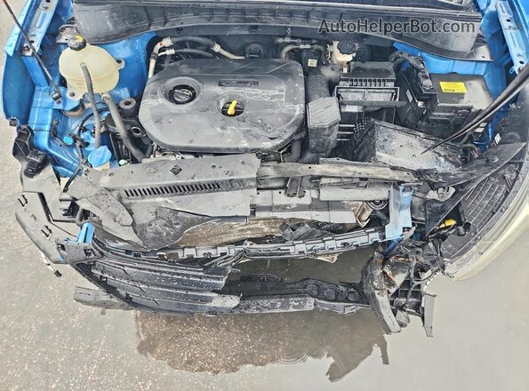 KM8J33A4XGU209520 2016 HYUNDAI TUCSON Blue Vista del compartimento del motor