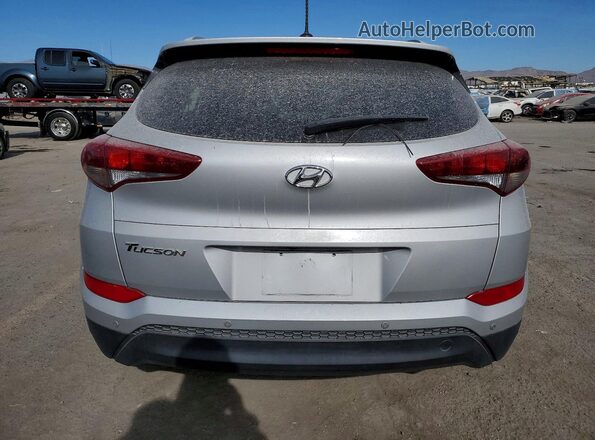 KM8J33A4XHU564902 2017 HYUNDAI TUCSON Silver უკანა ხედი