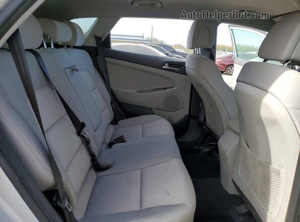 KM8J33A4XHU564902 2017 HYUNDAI TUCSON Silver უკანა სალონის ხედი