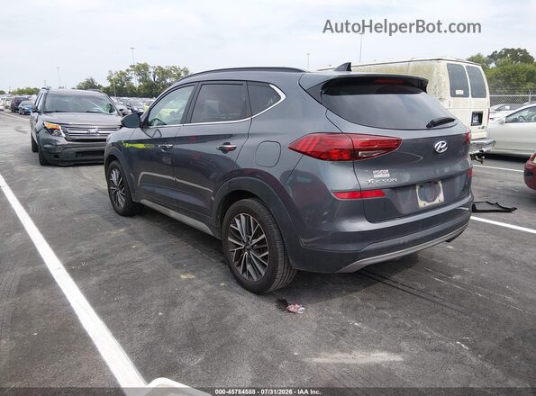 KM8J33AL2MU343215 2021 HYUNDAI TUCSON Gray Trasero izquierdo