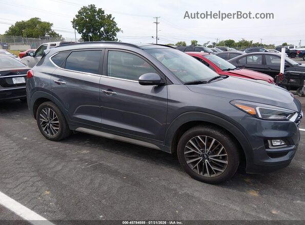 KM8J33AL2MU343215 2021 HYUNDAI TUCSON Gray Vista interior trasera