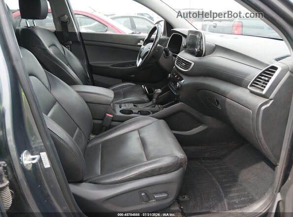 KM8J33AL2MU343215 2021 HYUNDAI TUCSON Gray Vista interior delantera