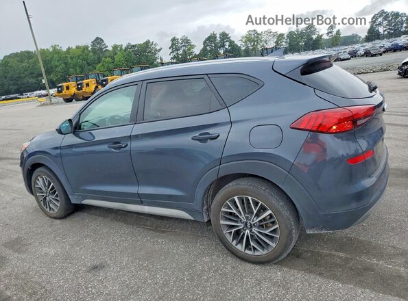 KM8J33AL3MU284661 2021 HYUNDAI TUCSON Gray Trasero izquierdo
