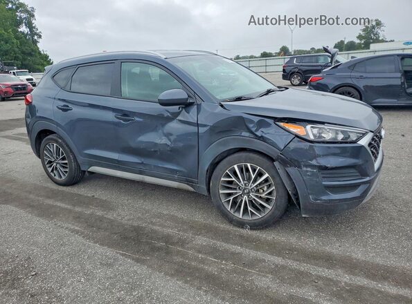 KM8J33AL3MU284661 2021 HYUNDAI TUCSON Gray Delantero derecho