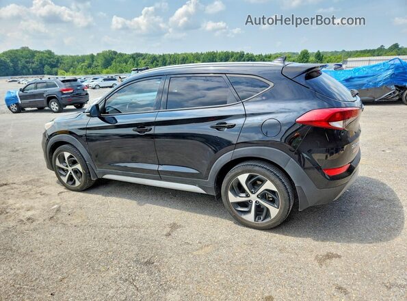 KM8J33AL4JU817855 2018 HYUNDAI TUCSON Black Rear left