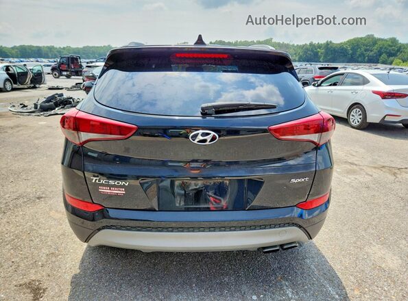 KM8J33AL4JU817855 2018 HYUNDAI TUCSON Black Rear view