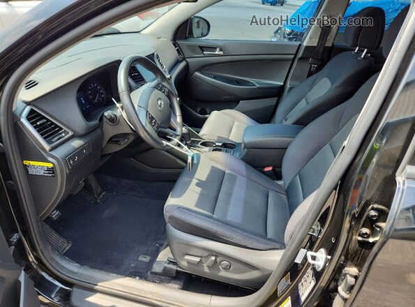 KM8J33AL4JU817855 2018 HYUNDAI TUCSON Black Front interior view