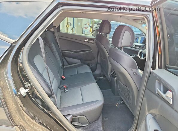 KM8J33AL4JU817855 2018 HYUNDAI TUCSON Black Rear interior view