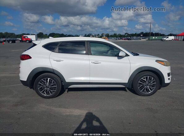 KM8J33AL4KU949418 2019 HYUNDAI TUCSON White Widok wnętrza z tyłu