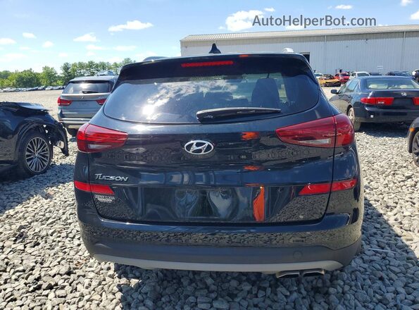 KM8J33AL5MU336761 2021 HYUNDAI TUCSON Black Rear view