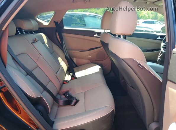 KM8J33AL5MU336761 2021 HYUNDAI TUCSON Black Rear interior view