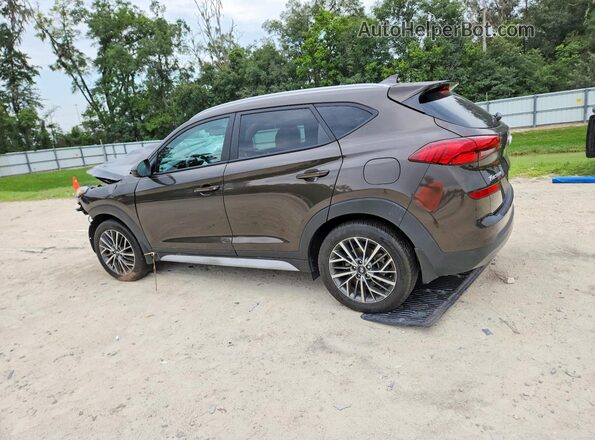 KM8J33AL6LU199070 2020 HYUNDAI TUCSON Brown Trasero izquierdo