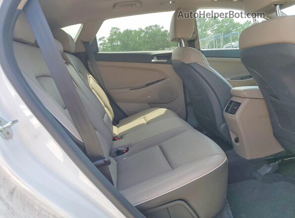 KM8J33AL8MU334826 2021 HYUNDAI TUCSON White Rear seats view