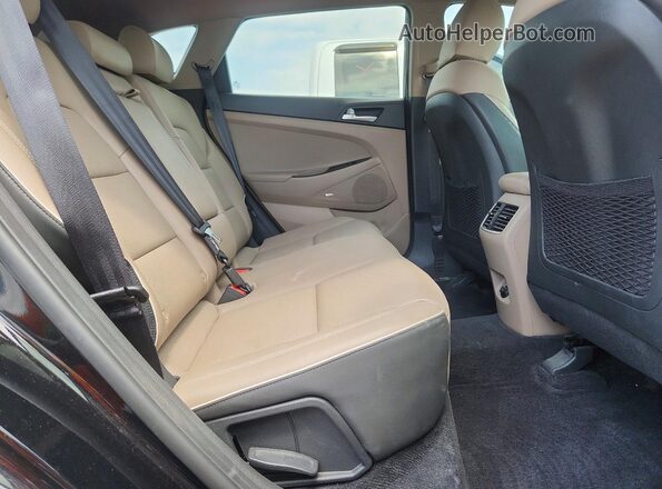 KM8J33AL9KU984245 2019 HYUNDAI TUCSON Black Vista interior trasera