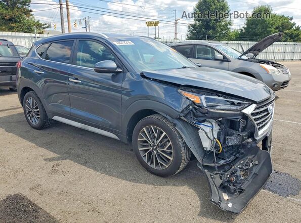 KM8J33AL9MU285149 2021 HYUNDAI TUCSON Gray Delantero derecho