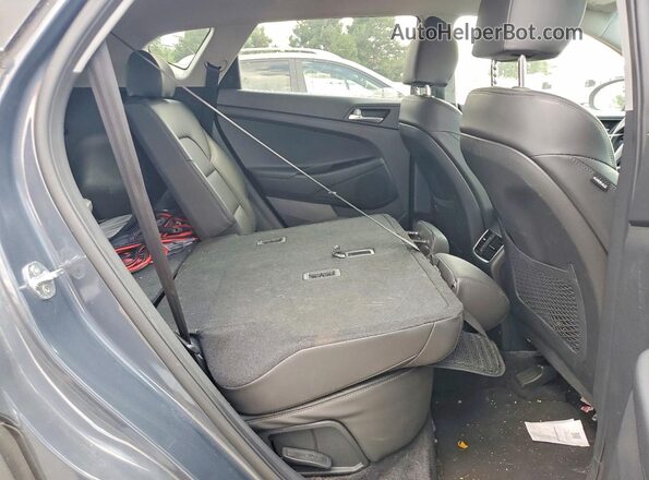 KM8J33AL9MU285149 2021 HYUNDAI TUCSON Gray Vista interior trasera