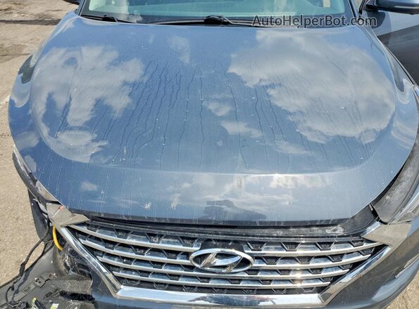 KM8J33AL9MU285149 2021 HYUNDAI TUCSON Gray Vista del compartimento del motor