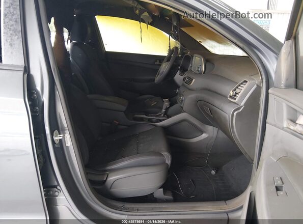 KM8J33ALXKU877981 2019 HYUNDAI TUCSON Green წინა სალონის ხედი