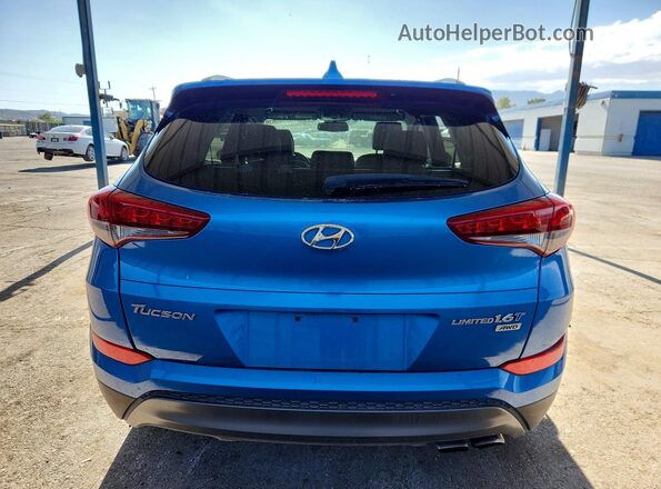 KM8J3CA20GU218967 2016 HYUNDAI TUCSON Синий Вид сзади