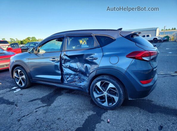 KM8J3CA21GU095907 2016 HYUNDAI TUCSON Gray Tył lewy