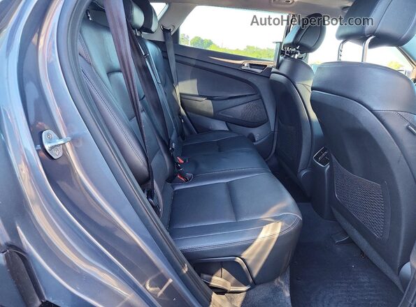 KM8J3CA21GU095907 2016 HYUNDAI TUCSON Gray Widok wnętrza z tyłu