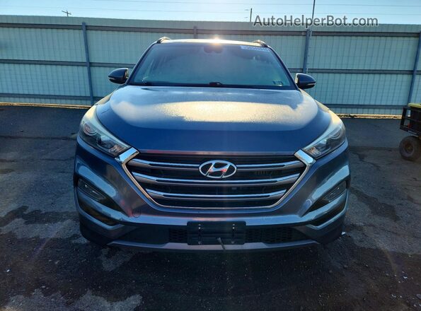 KM8J3CA21GU095907 2016 HYUNDAI TUCSON Gray Widok z przodu