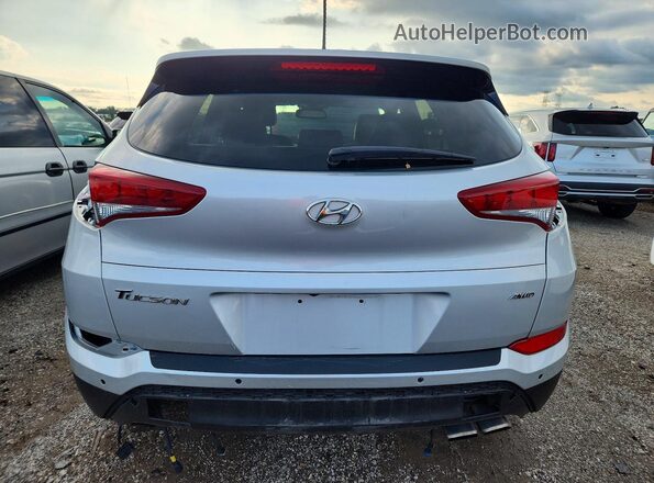 KM8J3CA21HU572000 2017 HYUNDAI TUCSON Silver უკანა ხედი