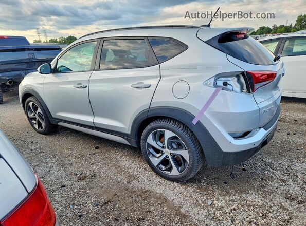 KM8J3CA21HU572000 2017 HYUNDAI TUCSON Silver უკანა მარცხენა