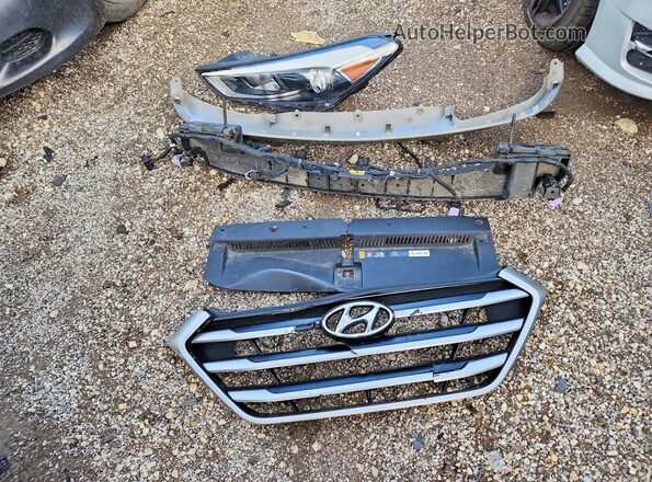 KM8J3CA21HU572000 2017 HYUNDAI TUCSON Silver VIN კოდის სტიკერის ხედი