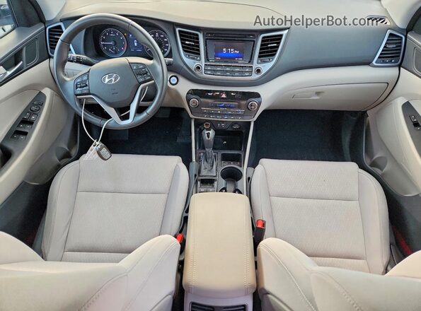 KM8J3CA21HU572000 2017 HYUNDAI TUCSON Silver წინა პანელის ხედი