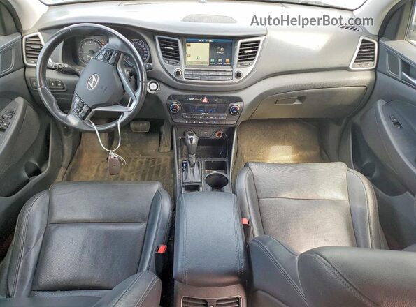 KM8J3CA22GU033884 2016 HYUNDAI TUCSON Gray Dashboard view