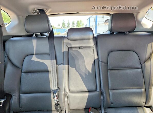 KM8J3CA22GU033884 2016 HYUNDAI TUCSON Gray Rear seats view