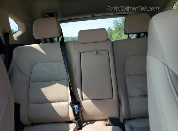 KM8J3CA22GU043315 2016 HYUNDAI TUCSON White Rear seats view
