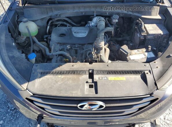 KM8J3CA22GU044190 2016 HYUNDAI TUCSON Gray Вид задньої частини салону