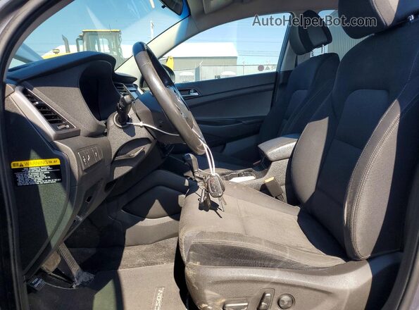 KM8J3CA22GU044190 2016 HYUNDAI TUCSON Gray Вид салону спереду
