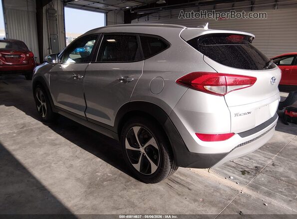 KM8J3CA22HU370539 2017 HYUNDAI TUCSON Silver Trasero izquierdo