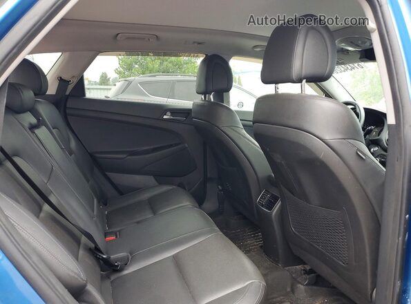 KM8J3CA23GU146646 2016 HYUNDAI TUCSON Blue Вид задньої частини салону