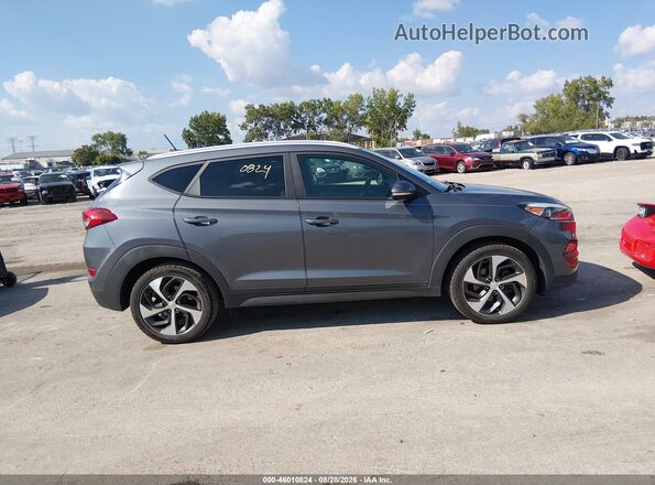 KM8J3CA23GU164743 2016 HYUNDAI TUCSON Gray Вид задньої частини салону