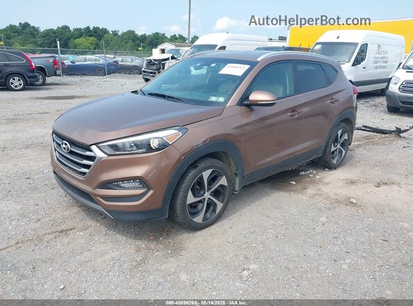 KM8J3CA24GU094394 2016 HYUNDAI TUCSON Brown Przód lewy