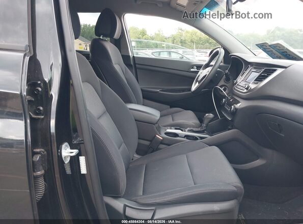 KM8J3CA24HU442115 2017 HYUNDAI TUCSON Black Front interior view