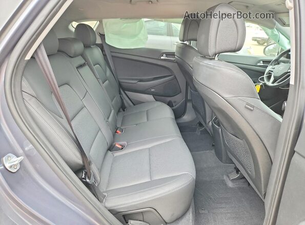 KM8J3CA25HU364833 2017 HYUNDAI TUCSON Gray Вид задньої частини салону