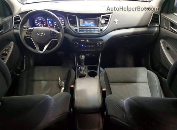 KM8J3CA26GU040563 2016 HYUNDAI TUCSON Черный Вид панели приборов