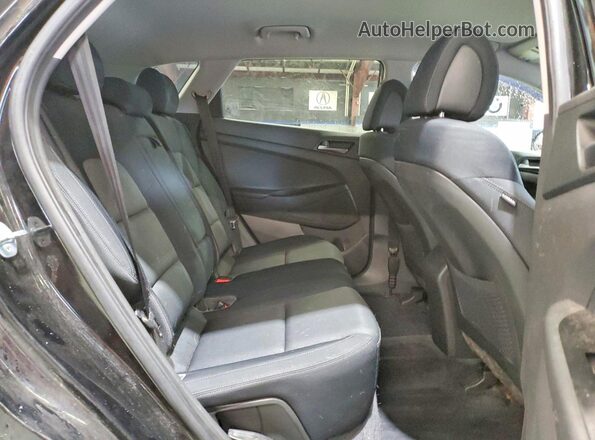 KM8J3CA26GU040563 2016 HYUNDAI TUCSON Черный Вид задней части салона