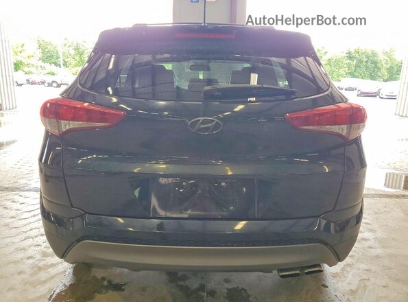 KM8J3CA26GU040563 2016 HYUNDAI TUCSON Черный Вид сзади