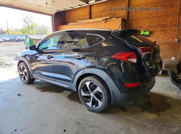 KM8J3CA26GU080710 2016 HYUNDAI TUCSON Black Rear left