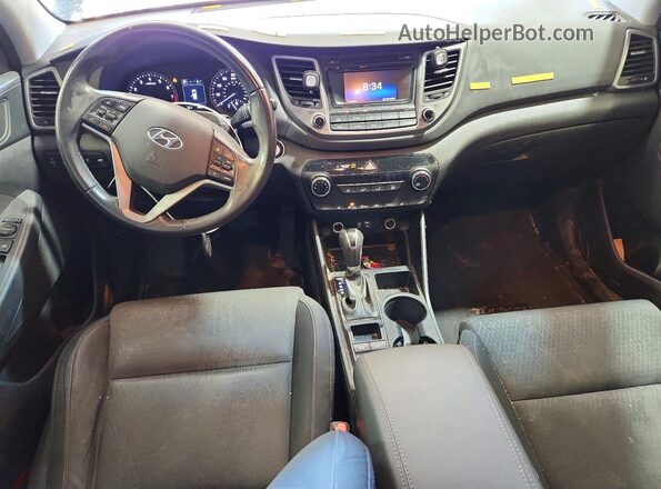 KM8J3CA26GU080710 2016 HYUNDAI TUCSON Black Dashboard view